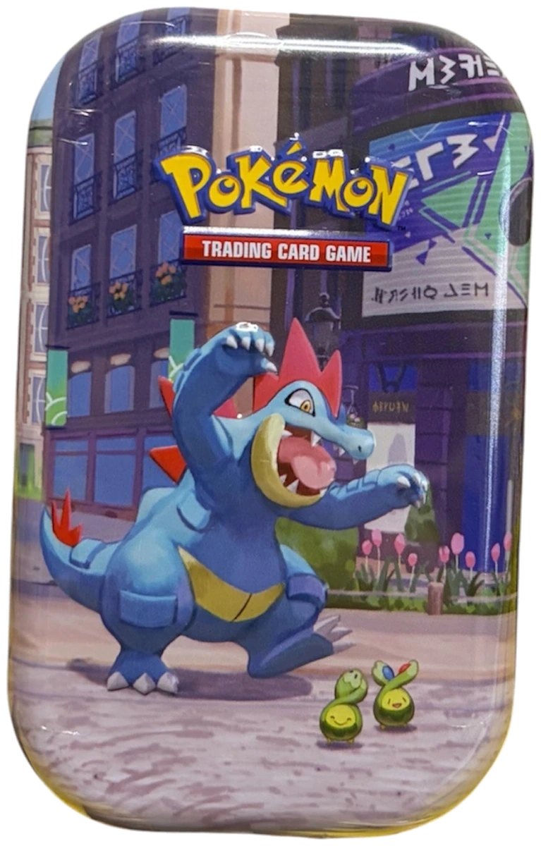 Pokémon-Mini-Tin mit Impergator in einer Stadtszene